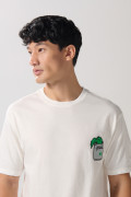 Camiseta crema clara manga corta con arte de Popeye