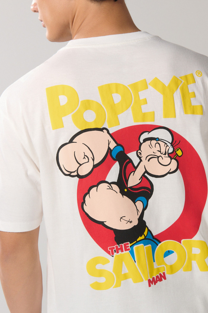 Camiseta crema clara manga corta con arte de Popeye