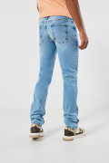 Jean slim azul claro tiro bajo con ligero desgaste