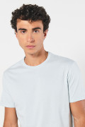 Camiseta ajustada unicolor en algodón con cuello redondo