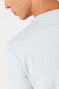 Camiseta ajustada unicolor en algodón con cuello redondo