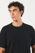 Camiseta en algodón cuello redondo unicolor y hombro rodado