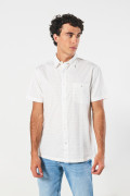 Camisa crema clara manga corta con diseños y bolsillo