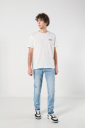 Jean slim azul claro con tiro bajo y diseños de manchas