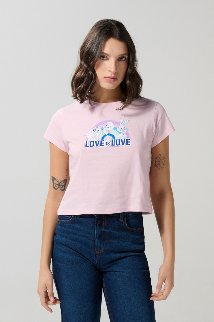 Camiseta rosada clara manga corta con arte de Looney Tunes