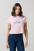 Camiseta rosada clara manga corta con arte de Looney Tunes