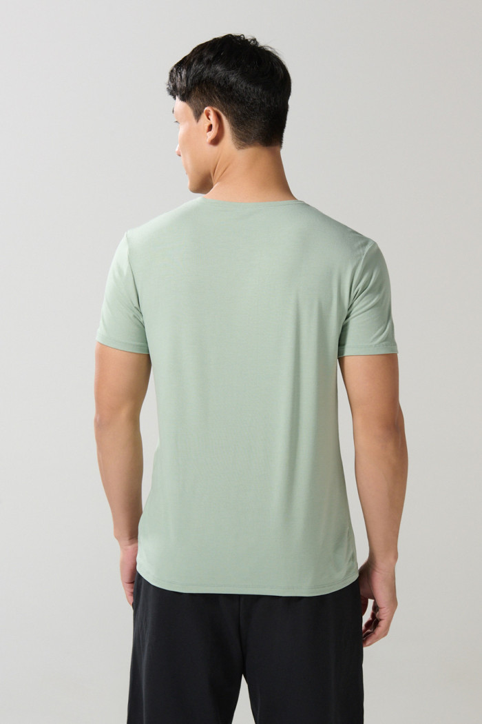 Camiseta ajustada en viscosa unicolor con cuello redondo