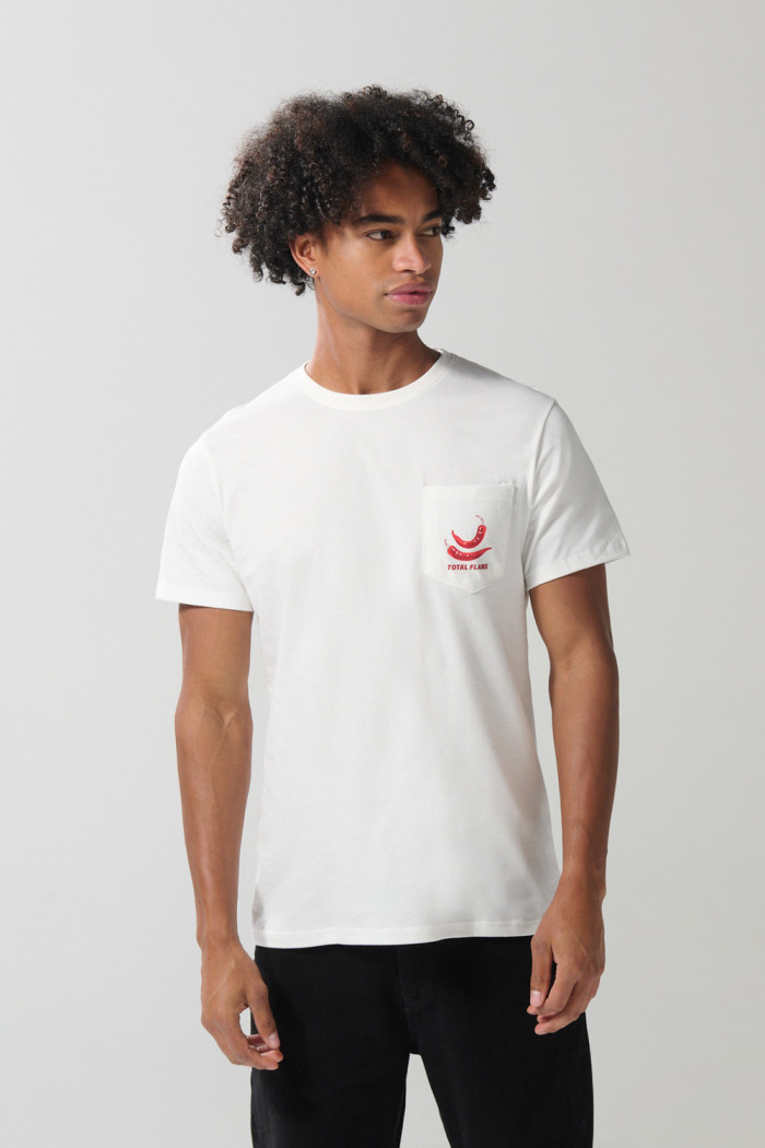 Camiseta en algodón unicolor con manga corta y bolsillo