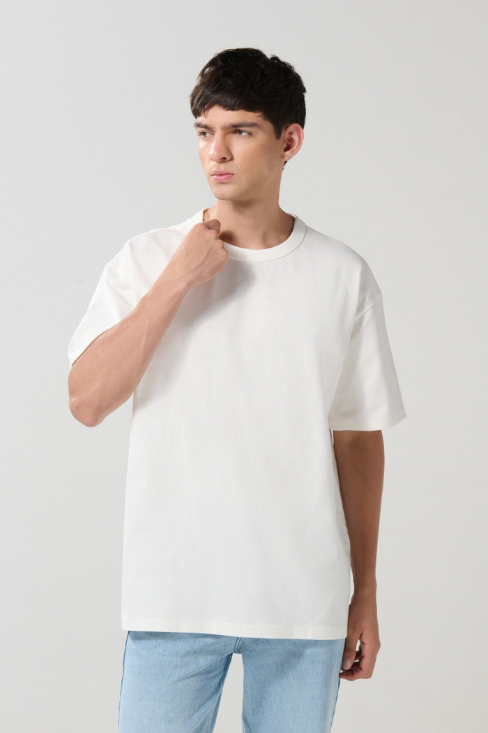 Camiseta oversize unicolor cuello redondo en algodón