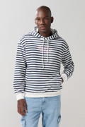 Buzo oversize crema a rayas con capota y bolsillo