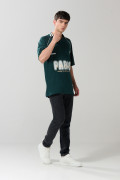 Camiseta polo unicolor con diseño college oversize