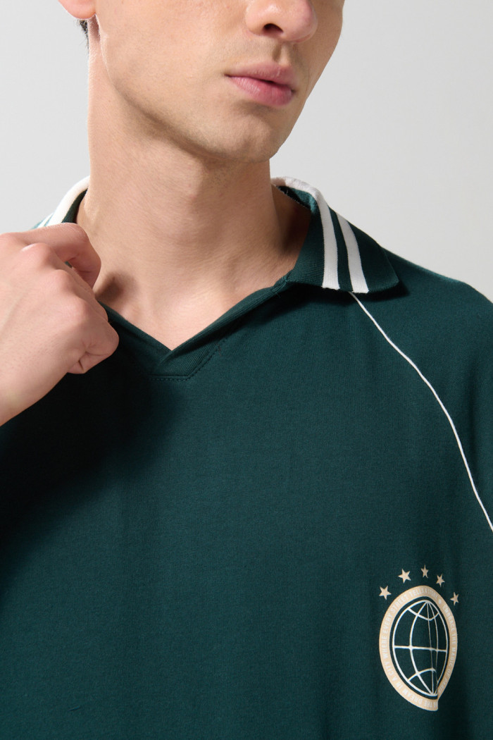 Camiseta polo unicolor con diseño college oversize