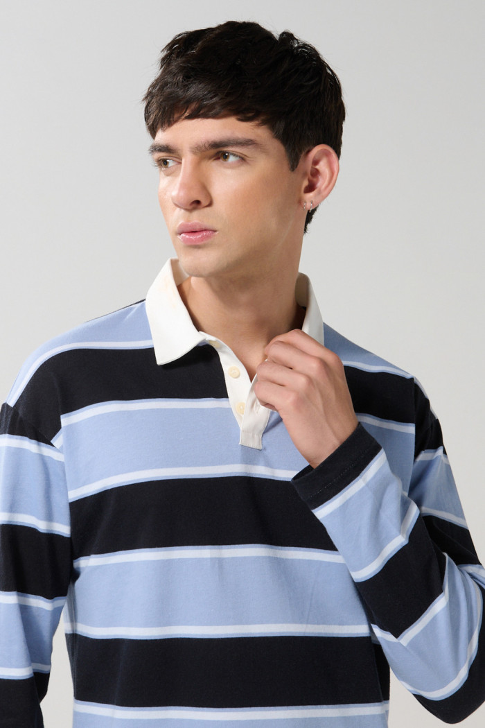 Camiseta azul intensa polo con rayas y manga larga