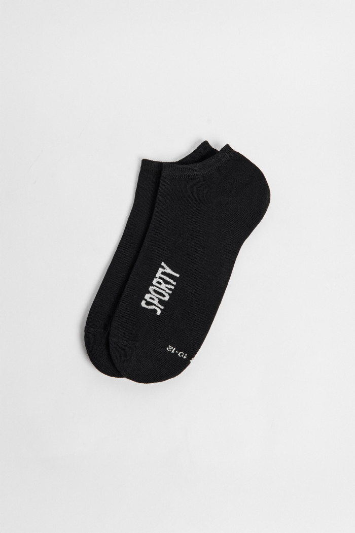 Medias tobilleras unicolores con texto lateral