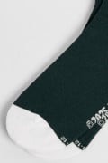 Medias cortas unicolores con diseño de Snoopy bordado
