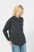 Blusa unicolor manga larga a rayas con bolsillo
