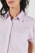 Blusa crop unicolor con manga corta y bolsillo