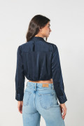 Blusa crop top unicolor con prenses y manga larga