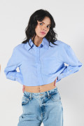 Blusa oversize crop top unicolor con manga larga