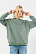 Buzo unicolor cuello redondo oversize con hombro caído