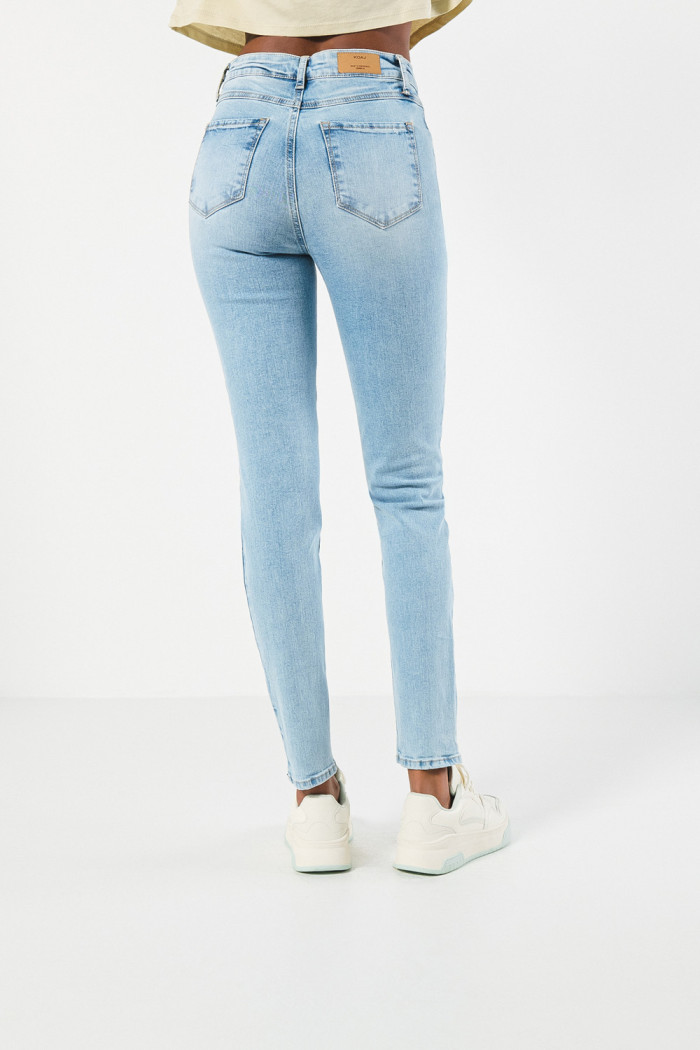 Jean súper tiro alto jegging azul ajustado con bolsillos
