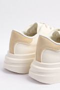 Tenis unicolores de plataforma con talones en contraste