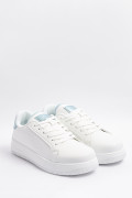 Tenis unicolores casuales con suela elevada y contrastes