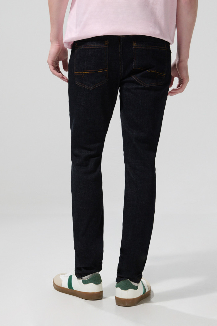 Jean skinny azul intenso ajustado con tiro bajo y costuras