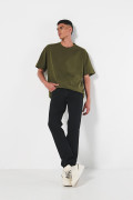 Jean ceñido slim negro con tiro bajo y 5 bolsillos