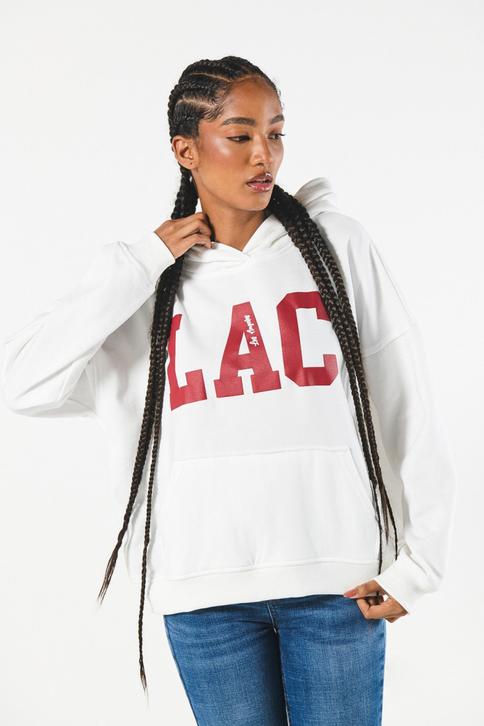 Buzo liviano oversize crema con capota y diseño college