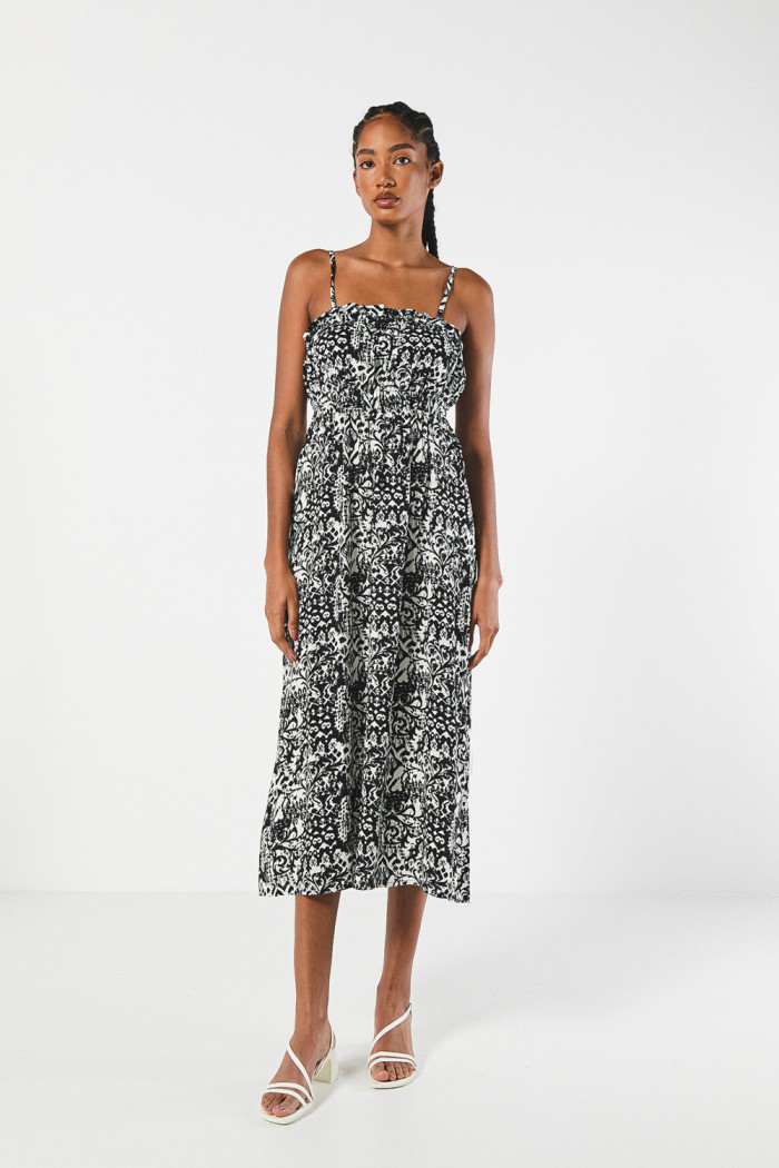Vestido largo negro con diseño animal print y tiras delgadas