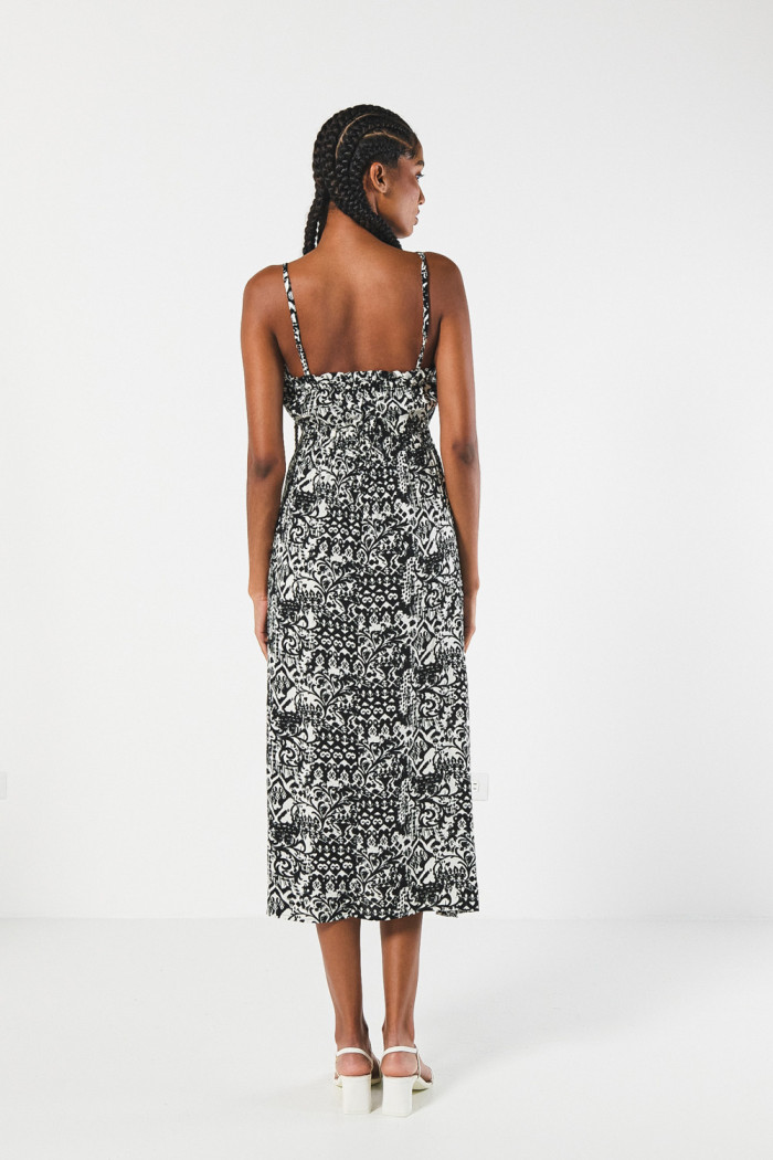 Vestido largo negro con diseño animal print y tiras delgadas