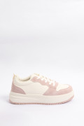 Tenis unicolores casuales con cortes y perforaciones