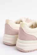 Tenis unicolores casuales con cortes y perforaciones