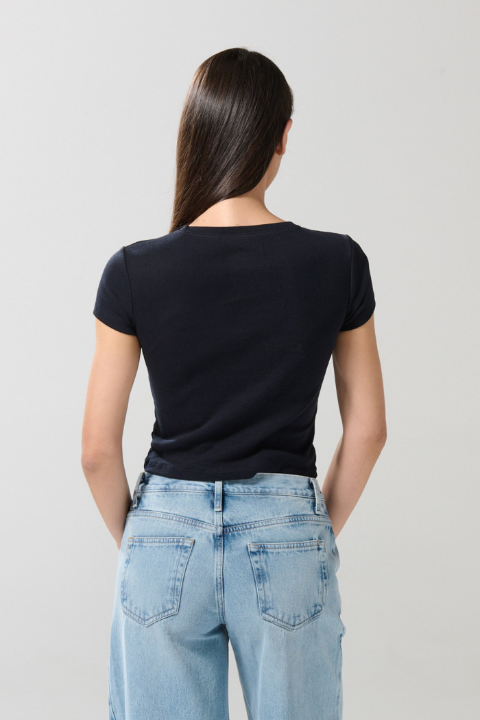 Camiseta azul manga corta con arte de Plaza Sésamo