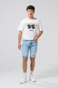 Bermuda slim tiro bajo azul clara con rotos en frente