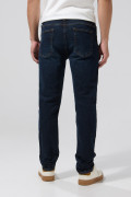 Jean slim azul oscuro con cremallera en frente y tiro bajo