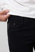 Jean skinny ceñido negro con tiro bajo y bolsillos