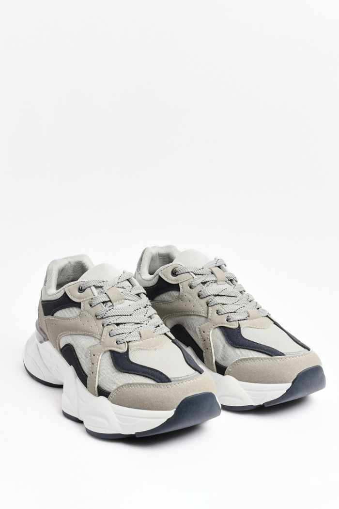 Tenis de plataforma deportivos grises con contrastes