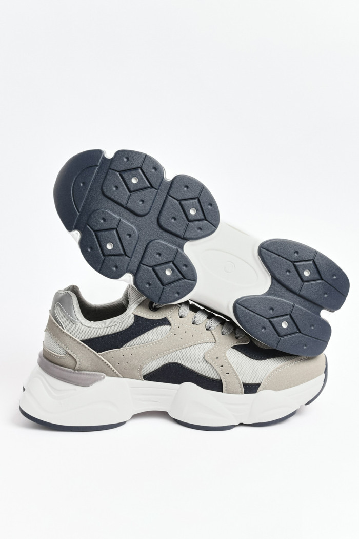 Tenis de plataforma deportivos grises con contrastes