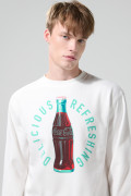 Buzo de Coca-Cola crema claro con cuello redondo