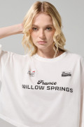 Camiseta oversize crop top crema con arte college