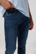 Jean skinny ajustado azul oscuro tiro bajo con bolsillos