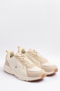 Tenis kakis de plataforma con cordones y cortes en contraste