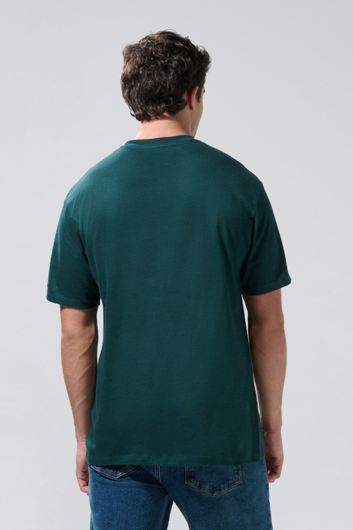 Camiseta cuello redondo verde con diseño de The Beatles