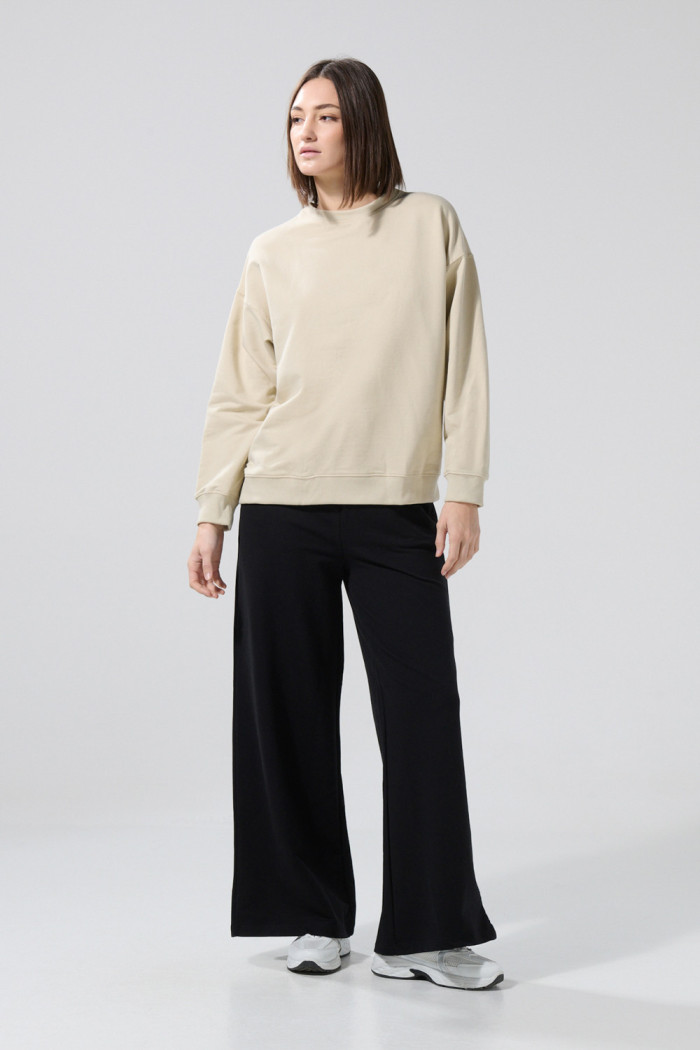Buzo cuello redondo perchado unicolor oversize