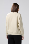 Buzo cuello redondo perchado unicolor oversize