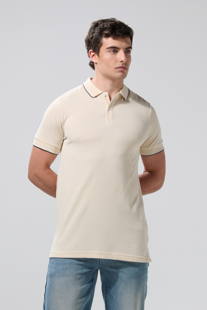 Camiseta polo unicolor manga corta con aberturas