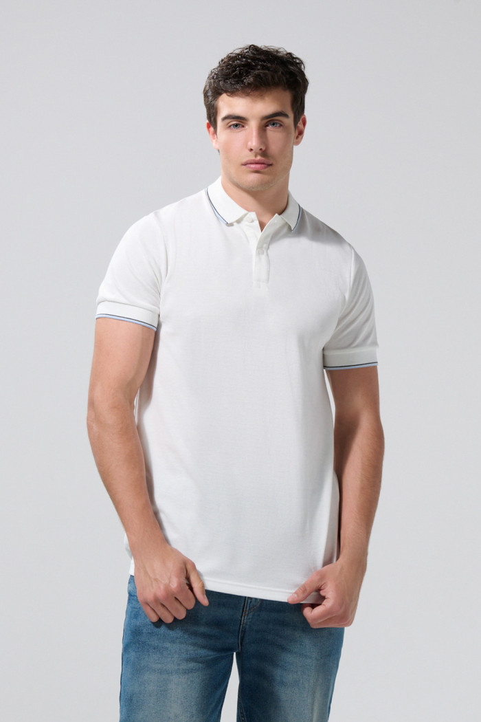 Camiseta polo unicolor manga corta con aberturas