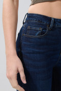 Jean jegging azul oscuro con bolsillos y tiro alto